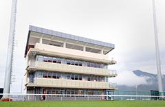 The trainers pavilion has an unobstructed view of the racecourse.